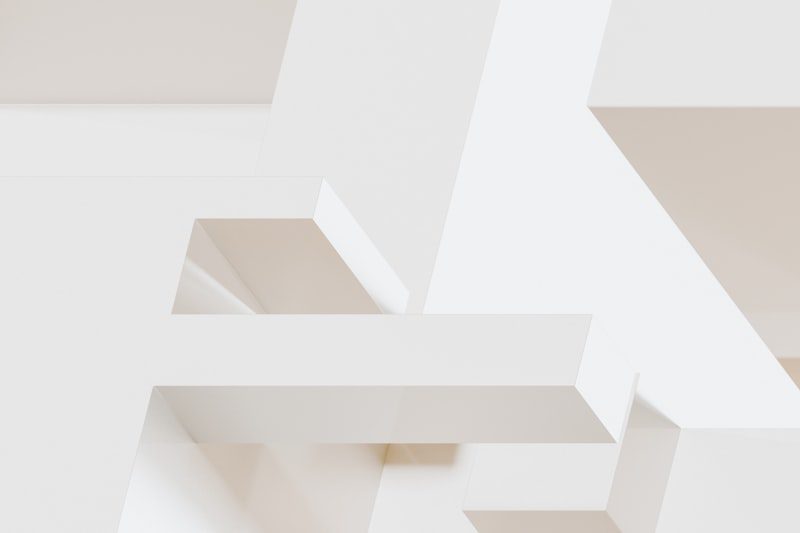 Abstract 3D geometric shapes in neutral tones